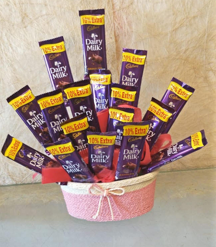 20 Chocolate Arrangement in Rafia Basket (Only For Delhi)delivery in Gurgaon