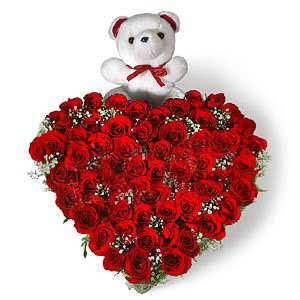 Heart Shape Arrangement of 50 Red roses with small cute teddydelivery in Faridabad