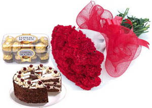 A hand bunch of 15 Carnation, 1/2kg cake and 16 Pc Ferrero Rocher Chocolate